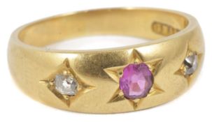 A Victorian ruby and diamond three stone gypsy ring. 18ct gold mount Condition: overall good