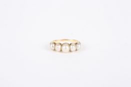 An early Victorian five pearl set half hoop ring, the pearls graduating in size to either side and