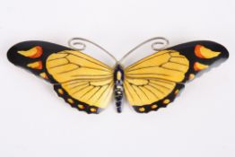 A Danish enamelled silver butterfly brooch by Marius Hammer, the wings guilloche enamelled in yellow