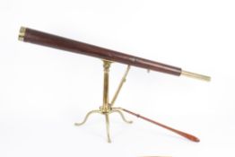 A 3 1/2-inch refracting single draw brass and leather bound telescope the 43-inch body tube with