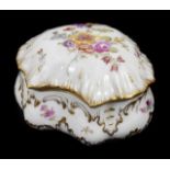A Dresden porcelain bowl and cover with transfer printed floral decoration and gilt edges. Signed to