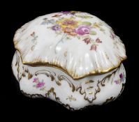 A Dresden porcelain bowl and cover with transfer printed floral decoration and gilt edges. Signed to