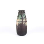 A large Muller Freres cameo glass vase with acid etched decoration of trees against a scenic lake