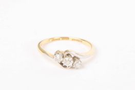 A three stone diamond set twist ring, 18ct and platinum mount Size O/PCondition: Overall good