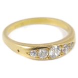 A Victorian five stone diamond set ring the stones graduating in size to either side, 18ct gold