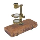 A Victorian brass travelling microscope by Banks of London the stem signed 'Banks, London, Math Inst
