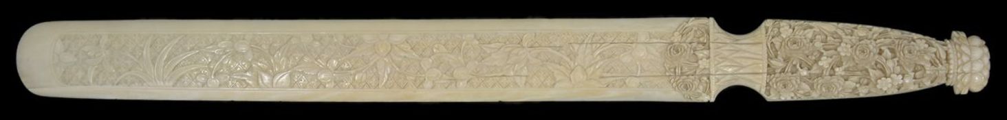 A late 19th century Chinese Canton carved ivory page turner the blade and handle finely carved