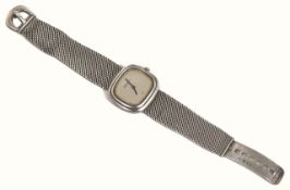 A sterling silver designer wristwatch on integral silver bracelet by Roy King. The textured