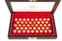 A set of John Pinches Kings and Queens 22ct gold presentation coins in a fitted box. 134.4 grams.
