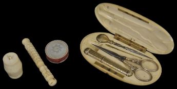 An early 20th century ivory cased vanity set together with an ivory bobbin case, needle case with