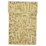 A Chinese Canton carved ivory calling card case c.1900, finely carved all over with figures,