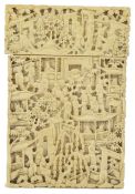 A Chinese Canton carved ivory calling card case c.1900, finely carved all over with figures,