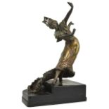 A large early 20th century French bronze figure of a dancer the lady wearing a long flowing dress,