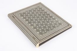 A late 19th / early 20th century Persian inlaid folio cover finely inlaid with geometric designs