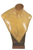 A large wax mannequin bust signed 'Elegan', supported on a wooden square pedestal. 48 cm high.