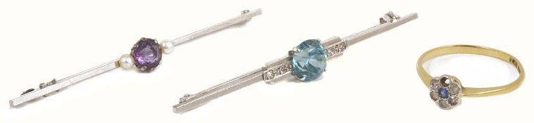 An Art Deco blue gem and diamond set bar brooch, the central stone within twin , stamped diamond set