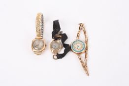 A 9ct gold Edwardian ladies wristwatch, the dial with Arabic numeral and blue guilloche enamel