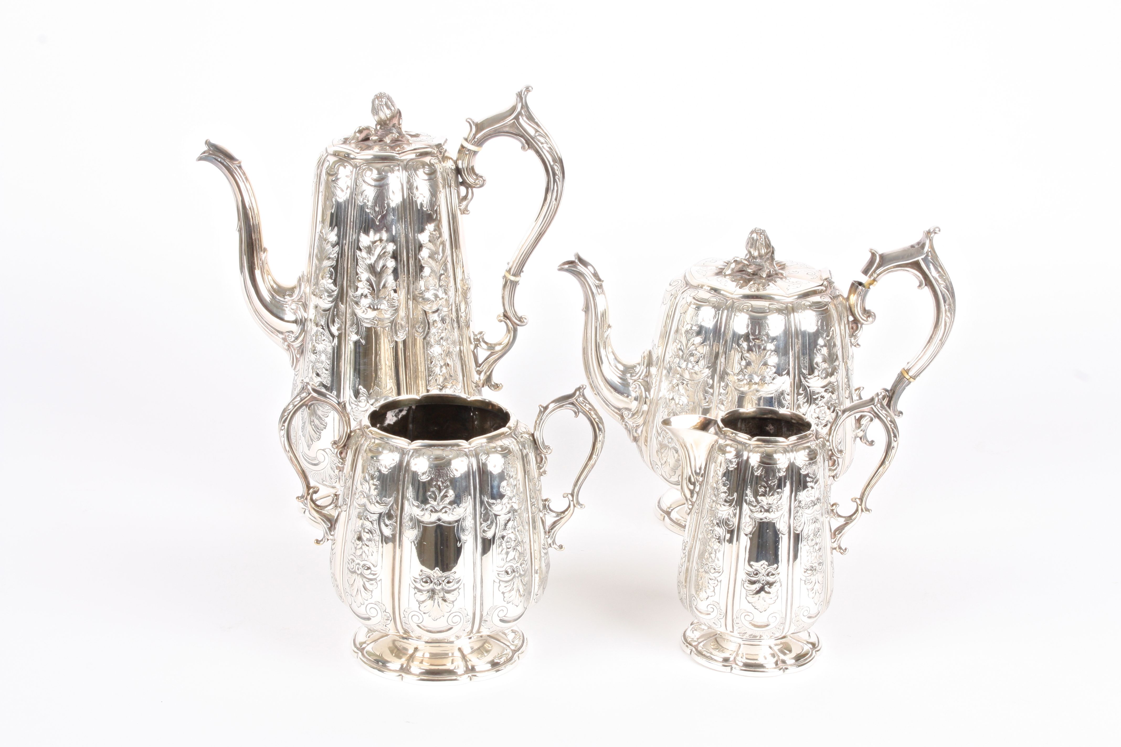 A silver plated Elkington and Co. four piece tea set with embossed acanthus leaf design height of
