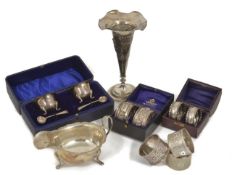 A large collection of assorted silver items including, three napkin rings (two matching), a silver