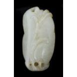 A carved Chinese jade pendant in the form of a lotus flower length 3.5cmCondition: In good overall