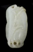 A carved Chinese jade pendant in the form of a lotus flower length 3.5cmCondition: In good overall