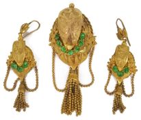 A striking high Victorian gilt Pinchbeck and emerald paste brooch and earrings. The brooch of high