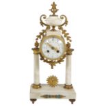 A late 19th century French marble and ormolu mantel clock the drum shaped case with white enamel