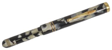 A rare 1930's Pullman Automatic 'capless' fountain pen of cream and black marbled design, Original