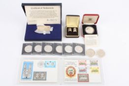A collection of first day covers with silver ingots comprising a Concorde silver ingot, two first