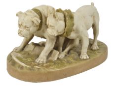 A large Royal Dux group of two bulldogs one looking mournful over a broken plate, the other