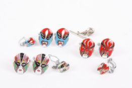 Three sets of novelty enamelled mask cufflinks, each set enamelled with stylised faces in bright