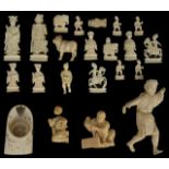 An early 20th century Chinese carved ivory part chess set together with various other pieces of