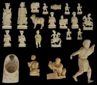 An early 20th century Chinese carved ivory part chess set together with various other pieces of