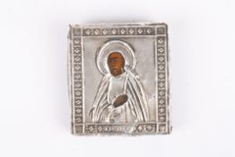 A small Russian .84 silver icon of a saint hallmarked and initialled BC and dated 1865. 5.25 x 4.