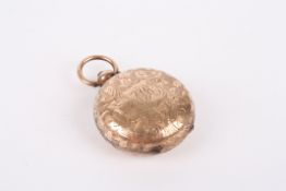 A Victorian 9ct rose gold sovereign holder hallmarked Birmingham 1892, with engraved floral