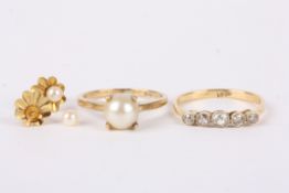 A gold and diamond five stone ring set with central old cut diamond weighing approx. 0.13cts flanked