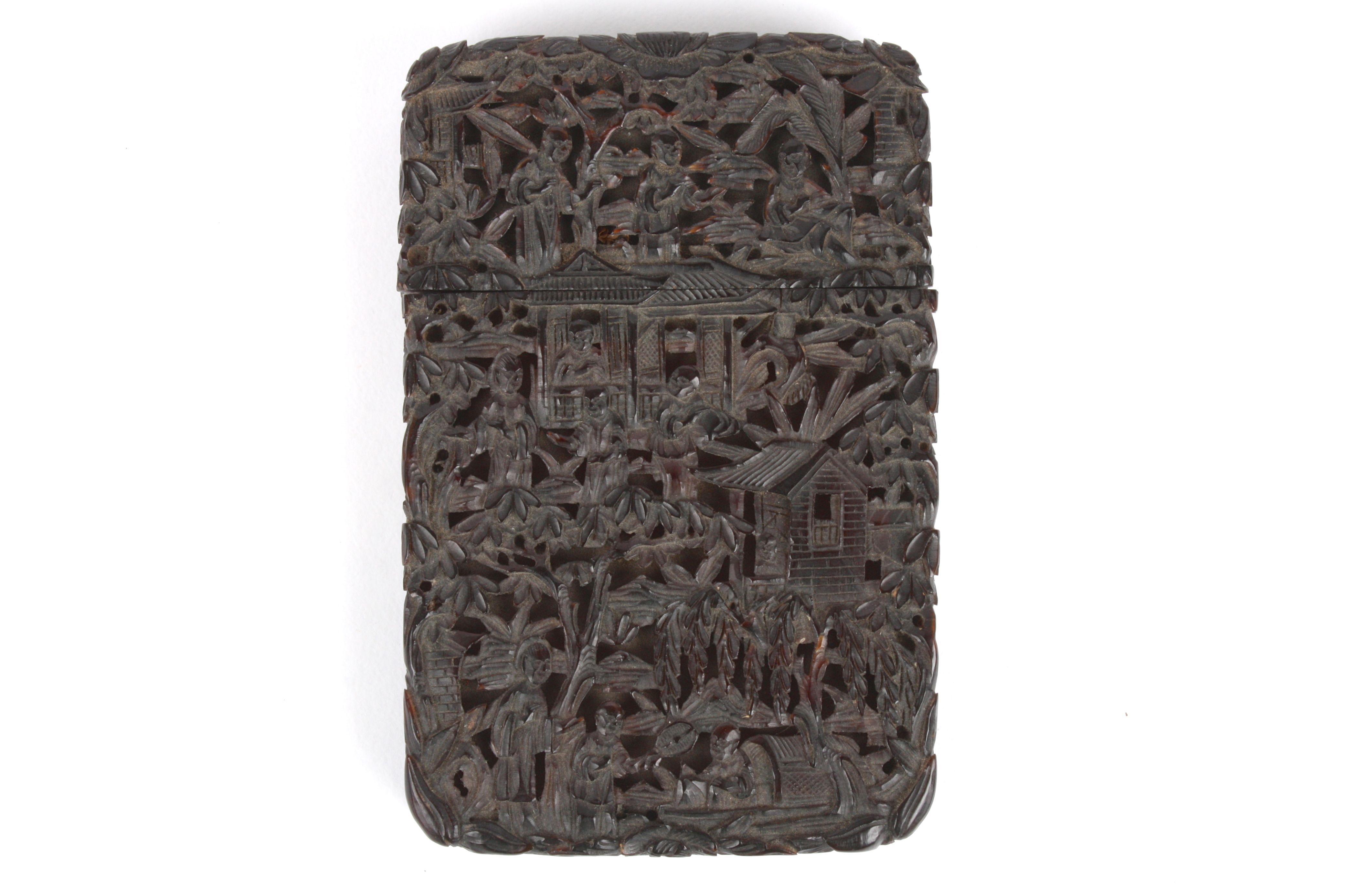 A late 19th century Chinese Canton carved tortoiseshell calling card case finely carved throughout