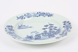 A Nanking Cargo blue and white circular plate decorated with a pagoda and trees with flowers to