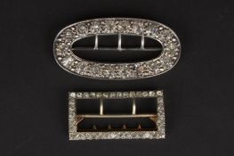 A Chester silver oval belt buckle set with paste stones, hallmarked 1899, and another buckle. (2)