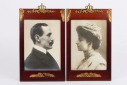 A pair of early 20th century Art Nouveau photograph frames containing photos of the King and Queen