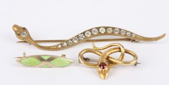 A Continental .585 gem set coiled snake brooch, a small silver and green enamel Scandinavian