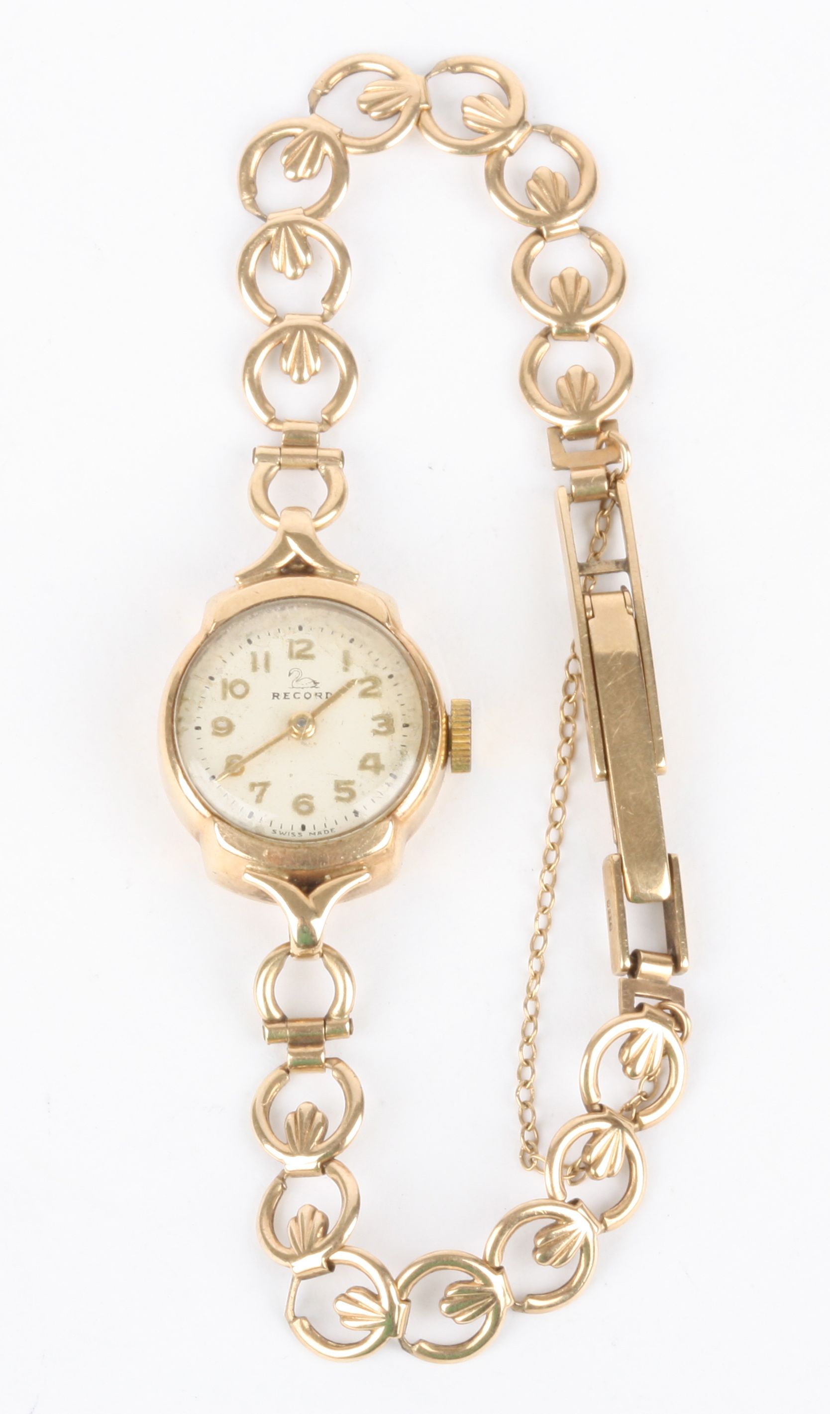 A 9ct gold Record ladies wrist watch with mechanical movement, with ring mounted strap. 8.2 grams
