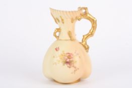 A large Royal Worcester blush ivory quatrefoil vase with rich gilt tree branch handle and