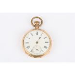 An early 20th century Continental 14K gold open face pocket watch with white enamel dial, black