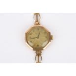 A 1920s 9ct gold ladies Rolex wrist watch the engine turned silvered dial with Arabic numerals set