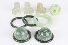 A group of assorted modern Chinese jade and hardstone comprising three carved dogs of foe, two