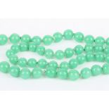 A graduated jade bead necklace. Condition: Good condition