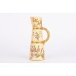 A Royal Worcester blush ivory tapering jug decorated with flowers in gilt, puce mark and numbered