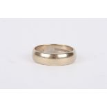 An 18ct white gold wedding band. Size K. 4.5 grams.Condition: Good condition with no damage.