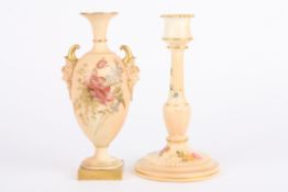 A Royal Worcester blush ivory vase with twin scrolled mask handles, together with a candlestick both